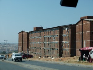 Just outside a hostel for men intended to house 5,000